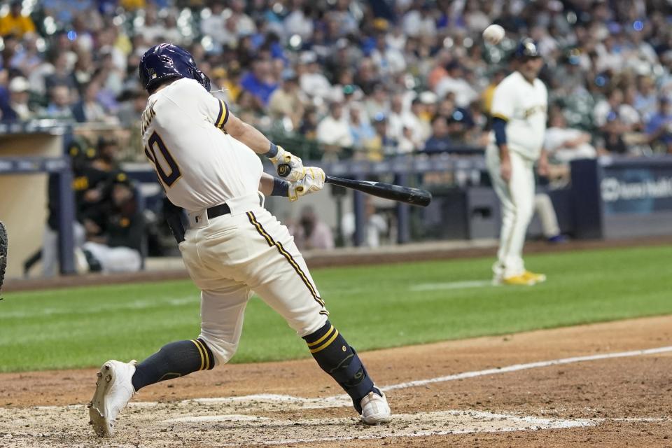 Milwaukee Brewers' Sal Frelick hits a three-run home run during the sixth inning of a baseball game against the Pittsburgh Pirates Thursday, Aug. 3, 2023, in Milwaukee. (AP Photo/Morry Gash)