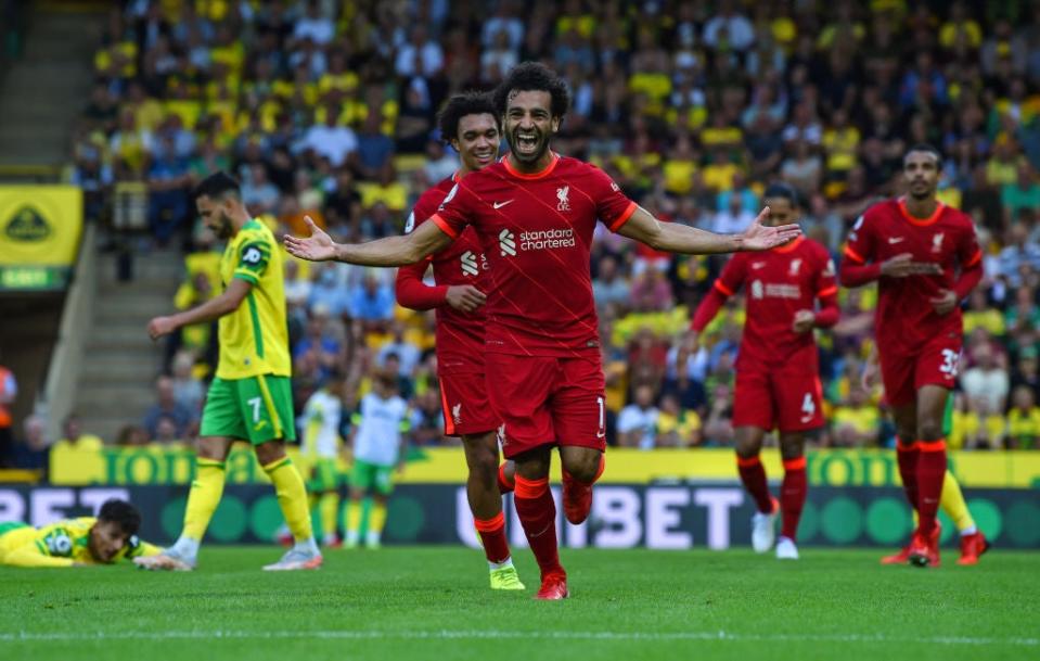 Salah celebrates after scoring Liverpool’s third goal at Carrow Road on the opening weekend of the Premier League season (Liverpool FC/Getty)