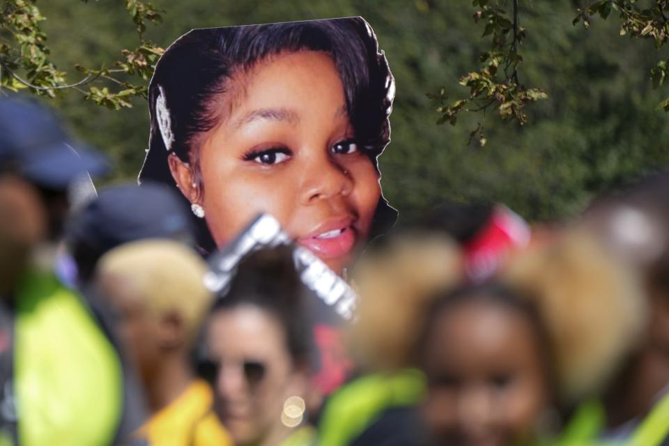 FILE - An image of Breonna Taylor, a 26-year-old Black woman who was fatally shot by police in her Louisville, Ky., apartment, is seen as people march to honor the 60th Anniversary of the March on Washington, Saturday, Aug. 26, 2023, in Washington. (AP Photo/Jacquelyn Martin, File)