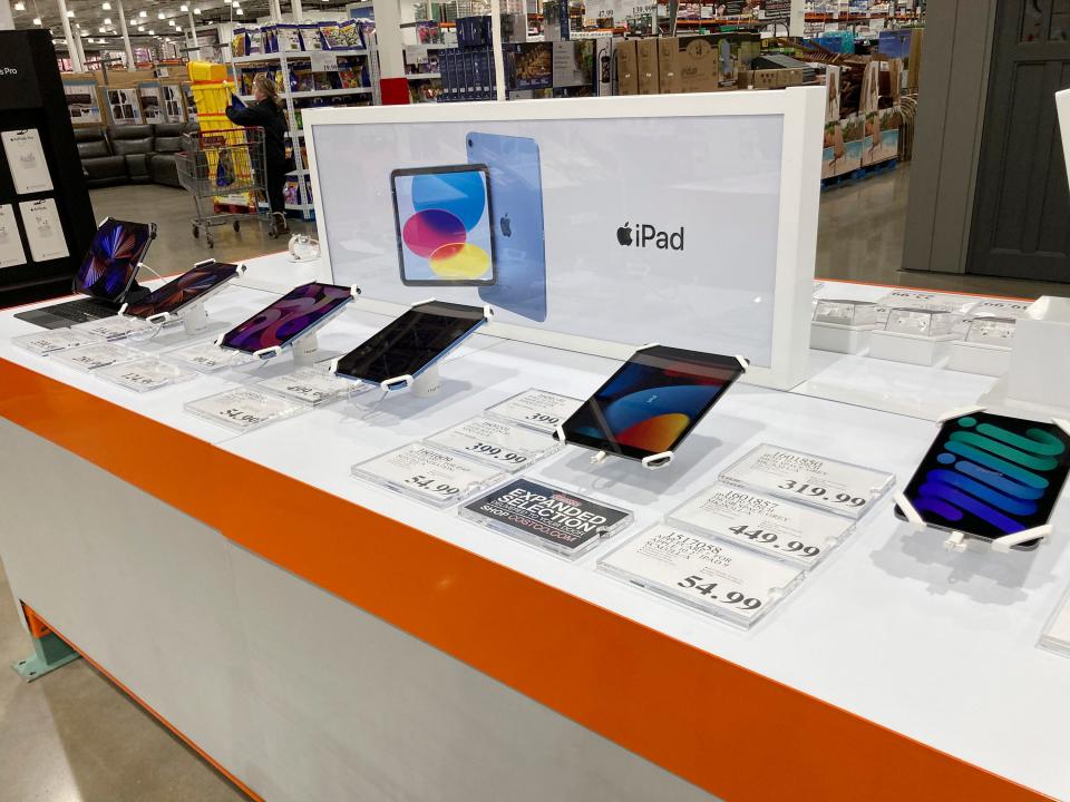 File - Apple iPads are displayed at a Costco warehouse on Monday, Feb. 21, 2023, in Sheridan, Colo. On Wednesday, the Labor Department reports on U.S. consumer prices for March. (AP Photo/David Zalubowski, File)