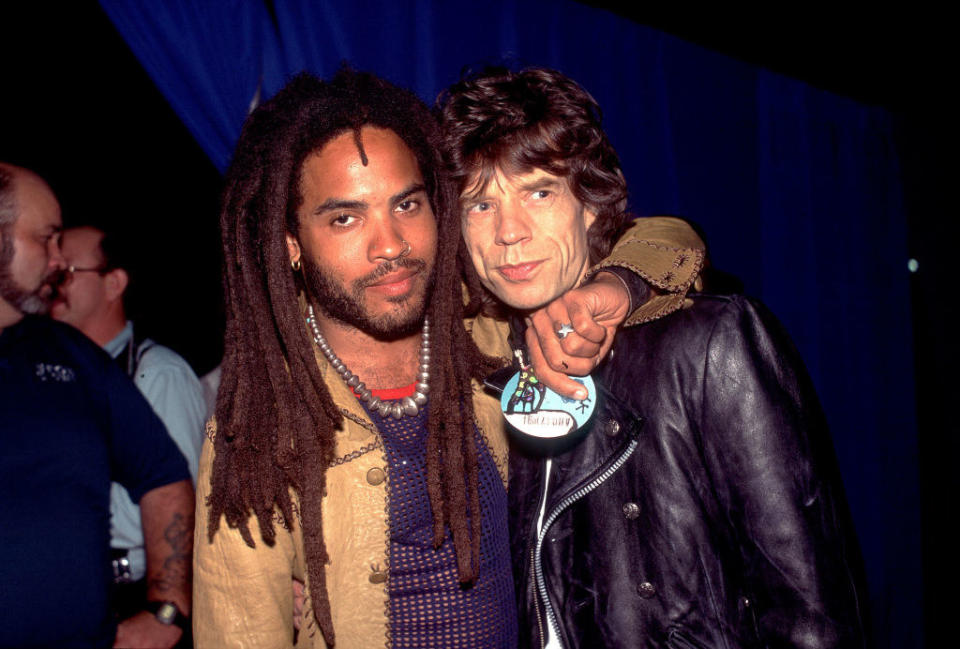 Wearing dreads and hugging Mick Jagger