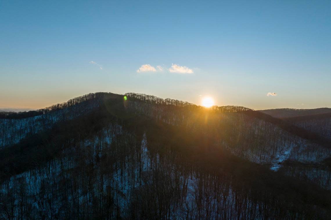 The sun sets near Black Mountain in Harlan County, the highest point in Kentucky, on Friday, January 27, 2023.