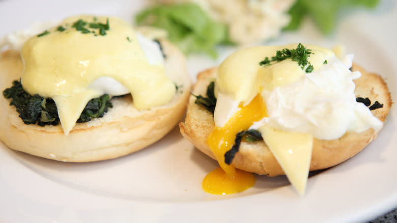 Traditional French eggs Florentine plated