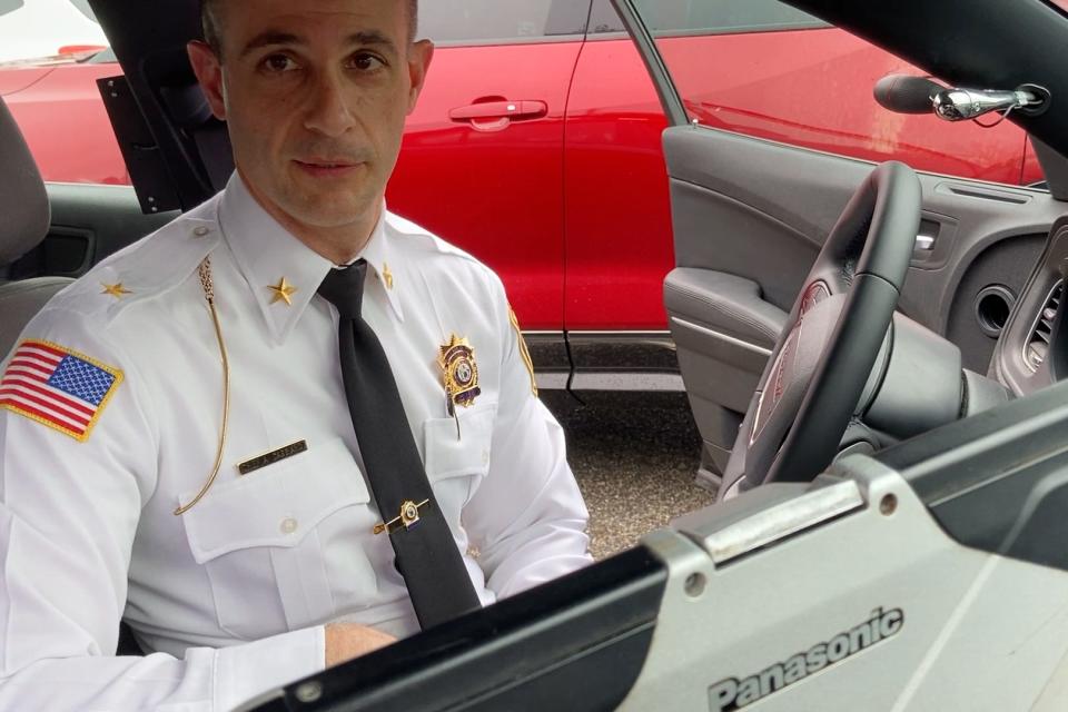 Montville Police Chief Andrew Caggiano, in a department vehicle with an automatic license plate reader. The town invested $49,000 in a new system in 2021.