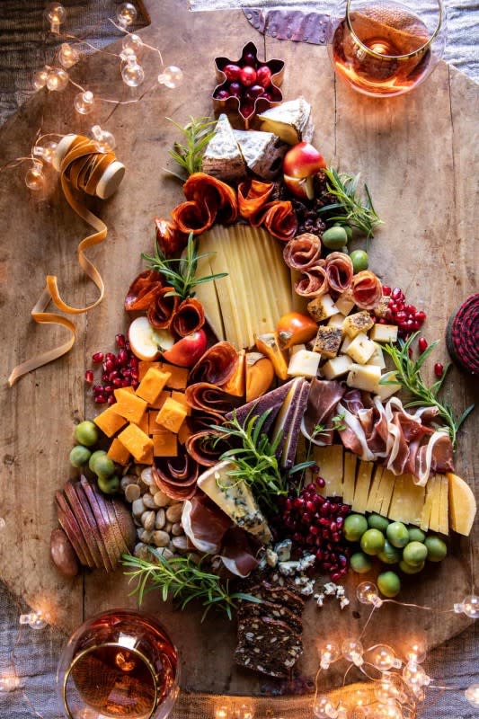 <p>Half Baked Harvest</p><p>A tasty appetizer that can double as a holiday party centerpiece!</p><p><strong>Get the recipe: <a href="https://www.halfbakedharvest.com/christmas-tree-cheese-board/" rel="nofollow noopener" target="_blank" data-ylk="slk:Christmas Tree Cheese Board;elm:context_link;itc:0;sec:content-canvas" class="link ">Christmas Tree Cheese Board</a></strong></p>