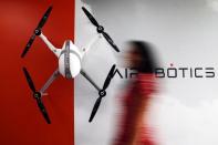 Don't stand so close: Singapore trials automated drones to check