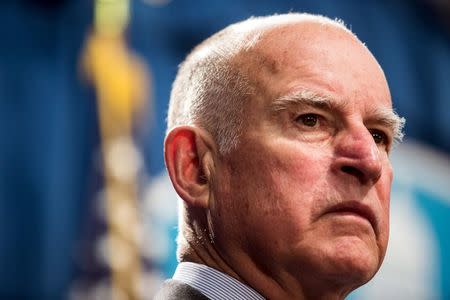 California Governor Jerry Brown looks on during a news conference at the State Capitol in Sacramento, California in this file photo taken March 19, 2015. REUTERS/Max Whittaker/Files