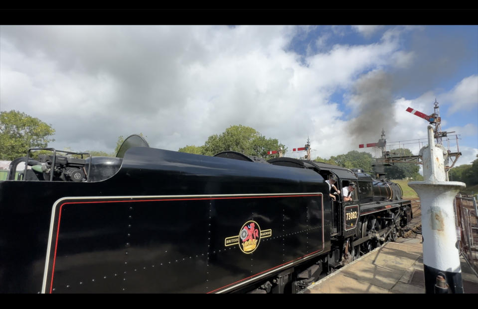 Steam train at a station