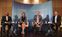 Stan Deal, president and CEO of Boeing Commercial Airplanes, center right, speaks, with Ted Colbert, left, President and CEO of Boeing Global Services, Leanne Caret, second from left, president and CEO of Boeing Defense, Space & Security, and Gordon Johndroe, vice president of Government Operations Communications of Boeing, during a press conference a day before Dubai Airshow in Dubai, United Arab Emirates, Saturday, Nov. 16, 2019. (AP Photo/Kamran Jebreili)