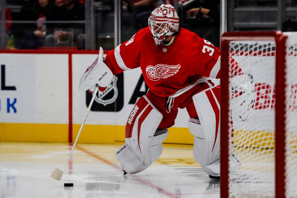 Detroit Red Wings goaltender Alex Nedeljkovic (39) looks before making a pass against the Buffalo Sabres during the second period of a preseason game at Little Caesars Arena in Detroit on Thursday, Sept. 30, 2021.