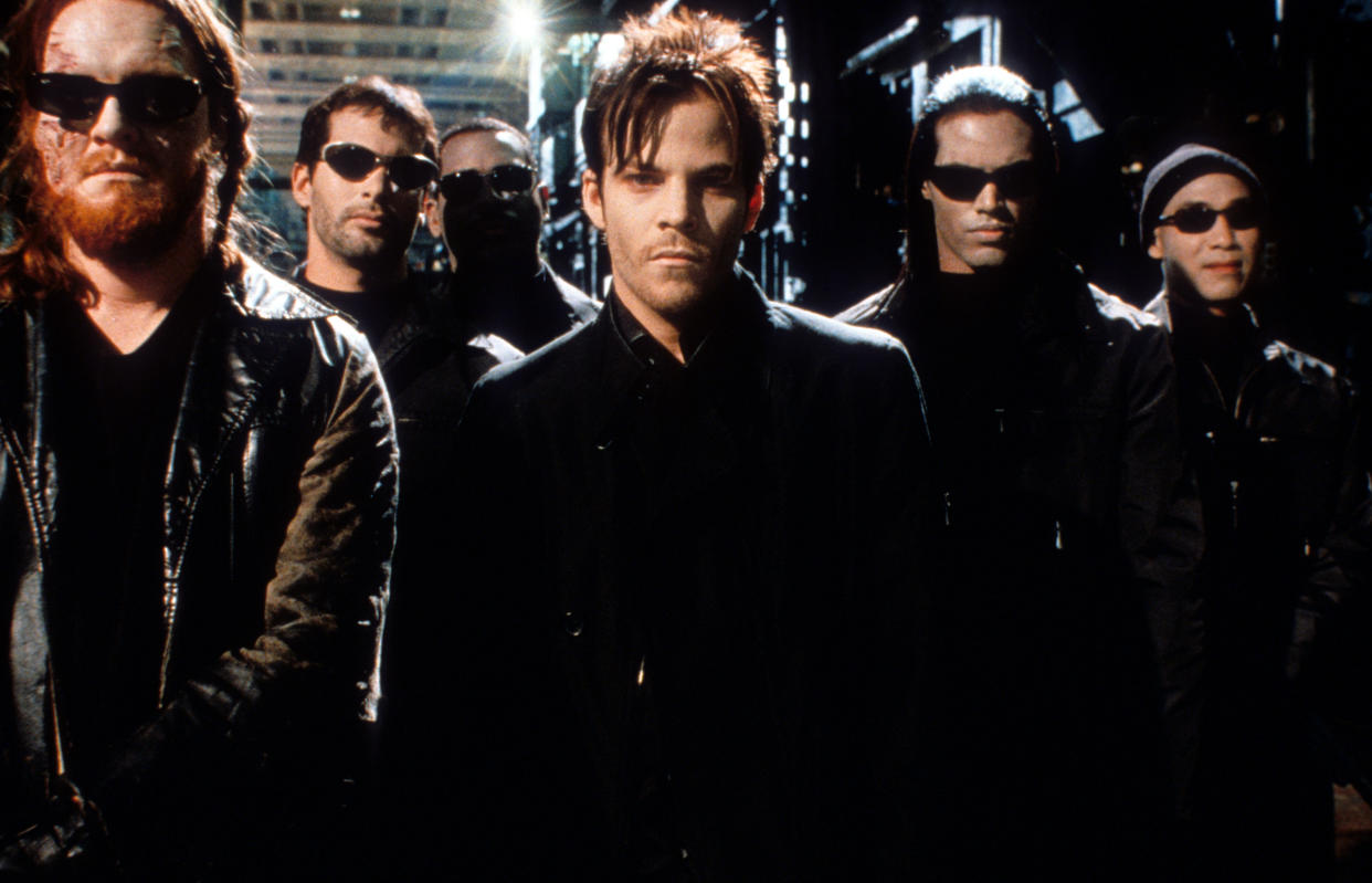 Stephen Dorff amongst men wearing sunglasses in a scene from the film 'Blade', 1999. (Photo by Amen Ra Films/Getty Images)