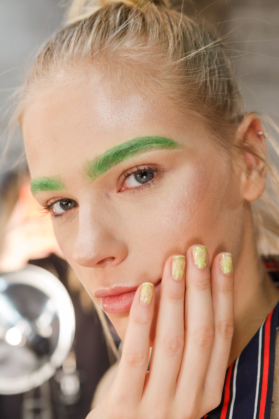 <p>Manicurist Tee Hundley is the mastermind behind these pastel green nails. (Photo: Imaxtree) </p>