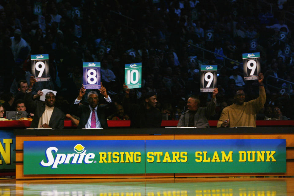 Dee Brown, Julius “Dr. J” Erving, Michael Jordan, Spud Webb, and Dominique Wilkins judge the Slam Dunk Contest during the 2003 NBA All-Star Weekend at Philips Arena on February 8, 2003, in Atlanta, Georgia. (Photo by Jed Jacobsohn/Getty Images)