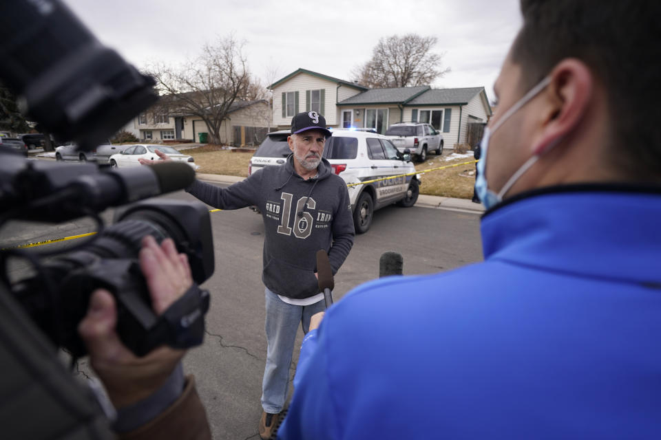 Kirby Klements talks about a piece of debris that crushed his pickup truck parked next to his home in Broomfield, Colo., as the plane shed parts while making an emergency landing at nearby Denver International Airport Saturday, Feb. 20, 2021. (AP Photo/David Zalubowski)