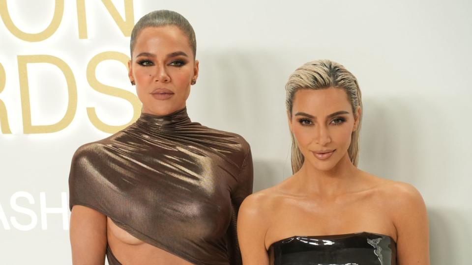 Khloe Kardashian and Kim Kardashian. Photo by Sean Zanni/Patrick McMullan via Getty Images.