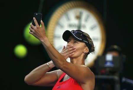 Tennis - Australian Open - Melbourne Park, Melbourne, Australia - 26/1/17 Croatia's Mirjana Lucic-Baroni takes a photo after losing her Women's singles semi-final match against Serena Williams of the U.S. .REUTERS/Thomas Peter