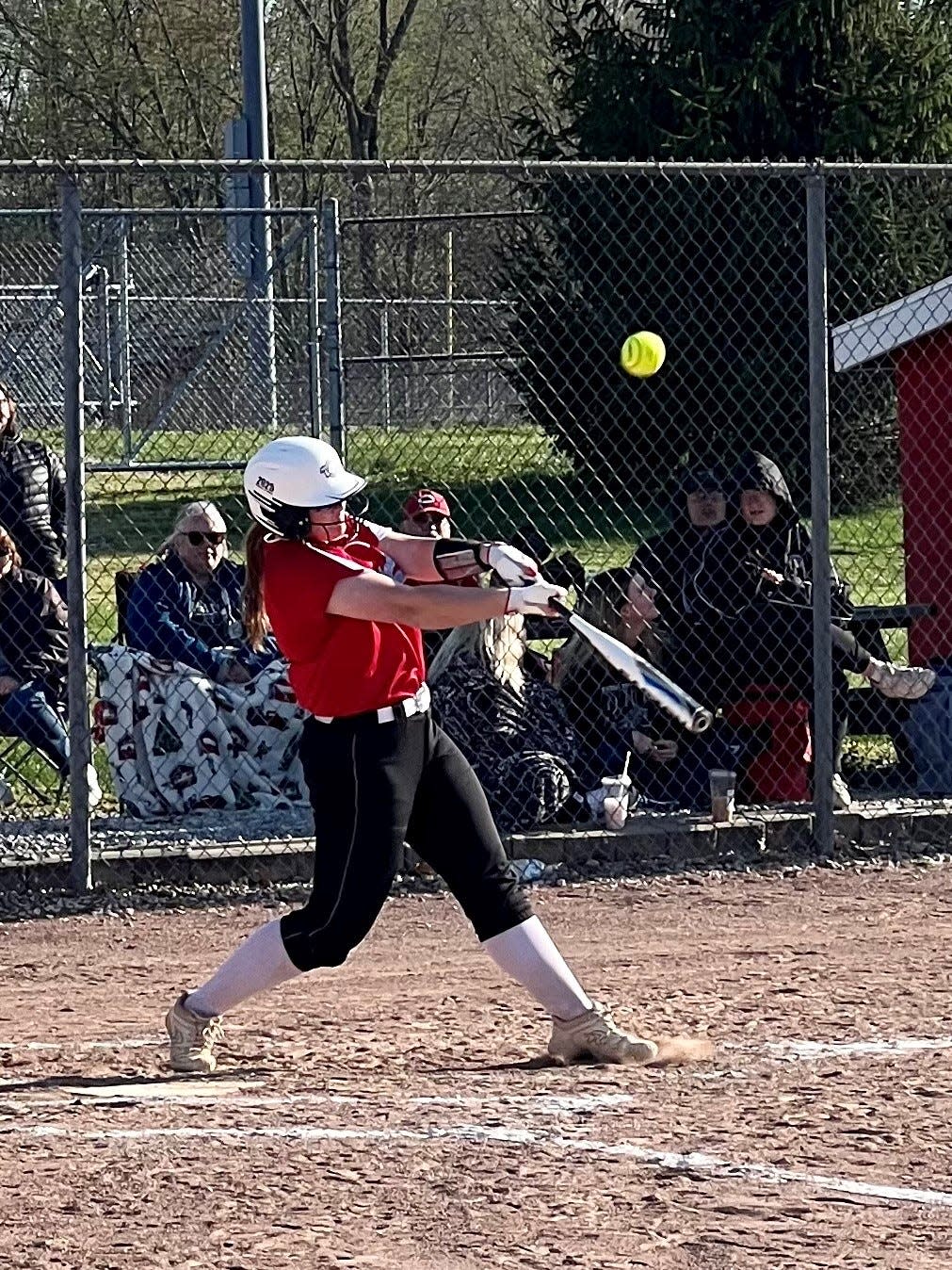 Ridgedale's Kenzie Delaney hits the ball during a home softball game against Ridgedale last year. She is the reigning Marion Star Softball Player of the Year.