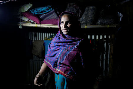 Rohingya Muslim refugee Sanmaraz, whose husband is in prison on charges of carrying ya ba, describes her story in front of a Reuters TV camera inside her room in the Leda Unregistered Refugee Camp, in Teknaf, Bangladesh, February 15, 2017. Picture taken February 15, 2017. REUTERS/Mohammad Ponir Hossain