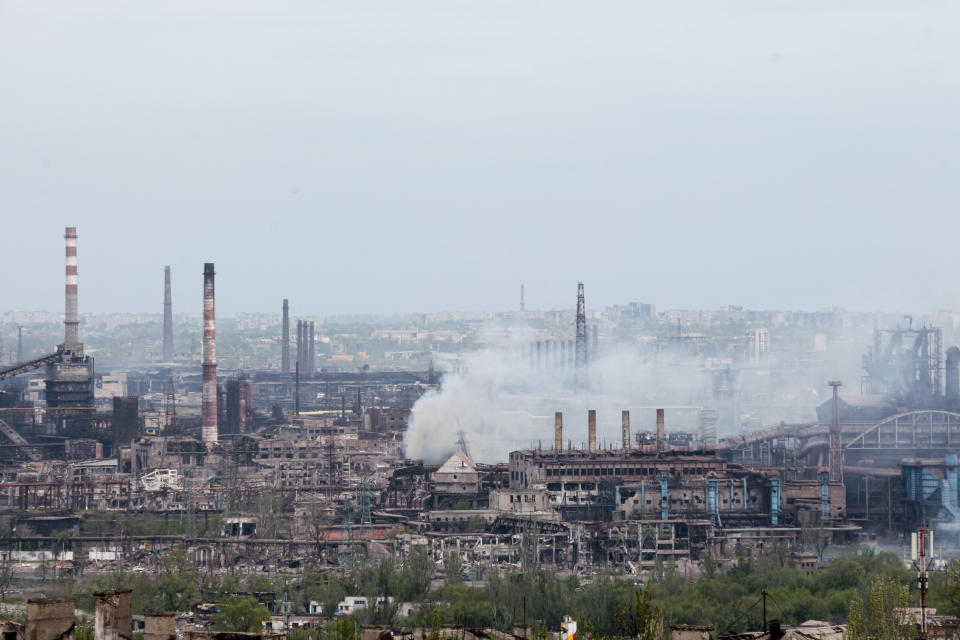 Smoke rises from the Metallurgical Combine Azovstal in Mariupol, in territory under the government of the Donetsk People's Republic, eastern in Mariupol, Ukraine, Thursday, May 5, 2022. (AP Photo)