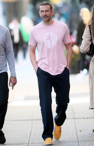 <p>Elder Ordonez/SplashNews.com</p> Bradley Cooper wearing Guest in Residence sneakers