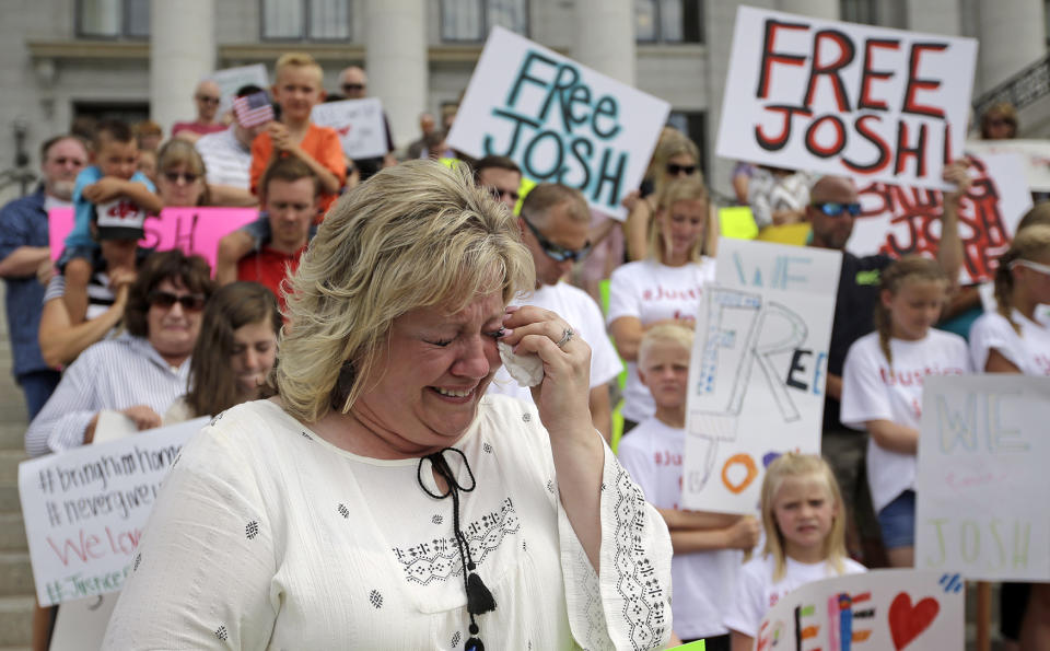 <p>Laurie Holt, the mother of Josh Holt, an American jailed in Venezuela, cries during a rally at the Utah State Capitol, July 30, 2016, in Salt Lake City. Laurie Holt hosted the rally in hopes of drawing attention to her son’s case. (Photo: Rick Bowmer/AP) </p>