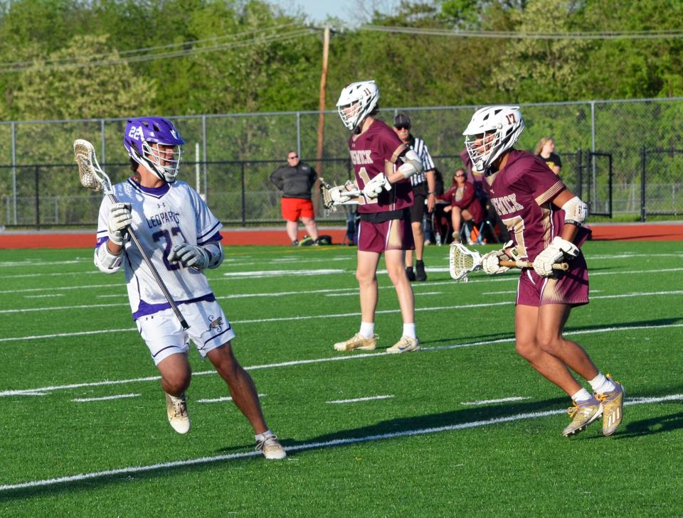 Smithsburg's Ryan Linn, left, scored seven goals to lead the Leopards to an 11-4 victory over Brunswick for the Class 1A West Region II title.