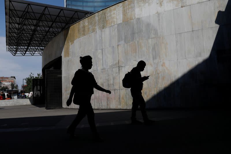 People are seen getting into the metro as the government plans to start easing restrictions amid the outbreak of the coronavirus disease (COVID-19) in Mexico City