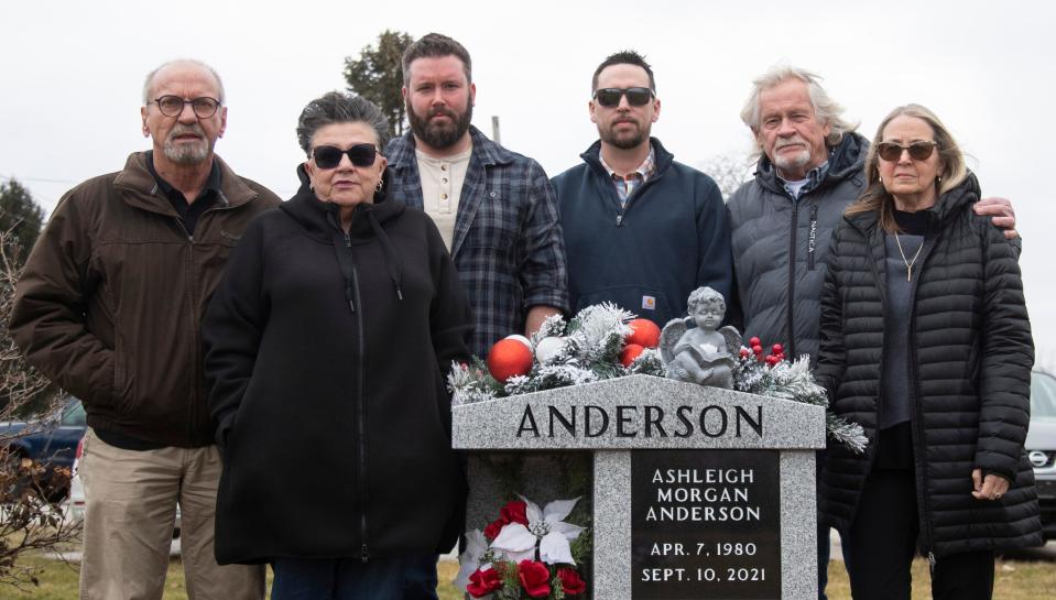 Members of Ashleigh Anderson’s family stand next to her gravestone in Tippecanoe Memory Gardens in West Lafayette, Ind. From left are her stepfather Mike Rockstroh, mother Nancy Rockstroh, stepbrother Jeremy Stockdale, brother Nate Anderson, father Larry Anderson and stepmother Donna Anderson.