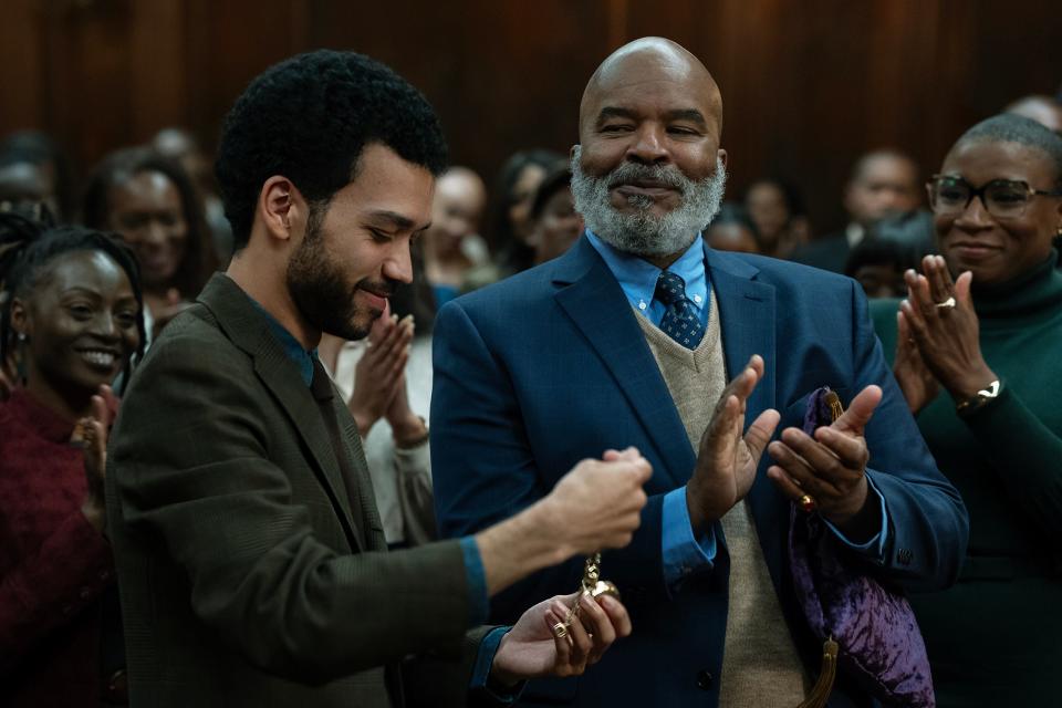 Roger (David Alan Grier, right) brings Aren (Justice Smith) into a secret organization of Black members who make white people's lives comfortable in the comedy "The American Society of Magical Negroes."