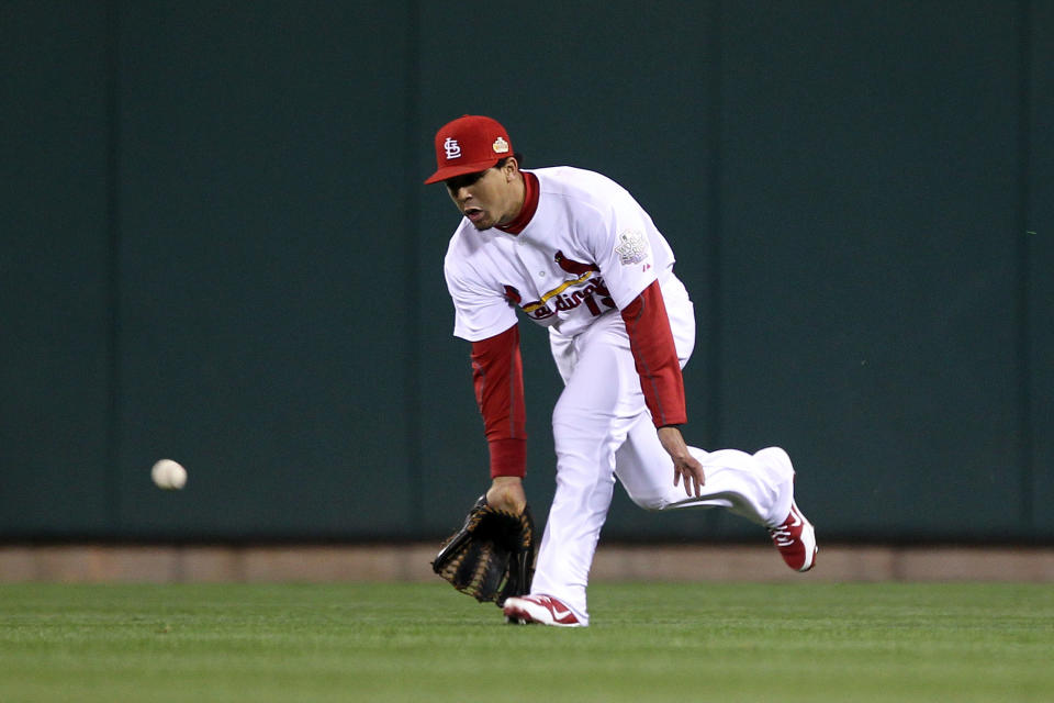 ST LOUIS, MO - OCTOBER 20: Jon Jay #19 of the St. Louis Cardinals fields a ball hit by Michael Young #10 of the Texas Rangers for the Rangers first hit of the game in the fourth inning during Game Two of the MLB World Series at Busch Stadium on October 20, 2011 in St Louis, Missouri. (Photo by Ezra Shaw/Getty Images)