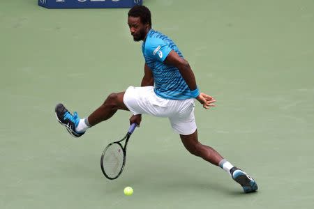 Sep 6, 2016; New York, NY, USA; Gael Monfils of France hits a forehand between his legs against Lucas Pouille of France (not pictured) on day nine of the 2016 U.S. Open tennis tournament at USTA Billie Jean King National Tennis Center. Monfils won 6-4, 6-3, 6-3. Mandatory Credit: Geoff Burke-USA TODAY Sports