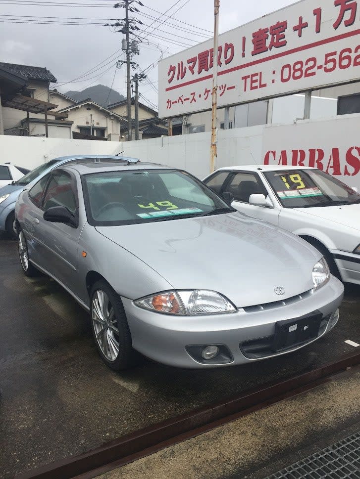 I’m probably the only tourist in Japan who runs to get a photo of a Toyota Cavalier at a used car lot.