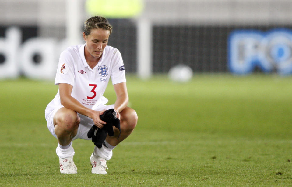 FILE - In this file photo dated Thursday, Sept. 10, 2009, England's Casey Stoney reacts after loosing to team Germany in the final of Women's Euro 2009 soccer match in Helsinki, Finland. After a top flight career as a national team player, Stoney has rebuilt the Man United women's soccer squad and the rebooted team play their first game Sunday Aug. 19, 2018, against Liverpool, with Stoney as coach. (AP Photo/Matthias Schrader, FILE)