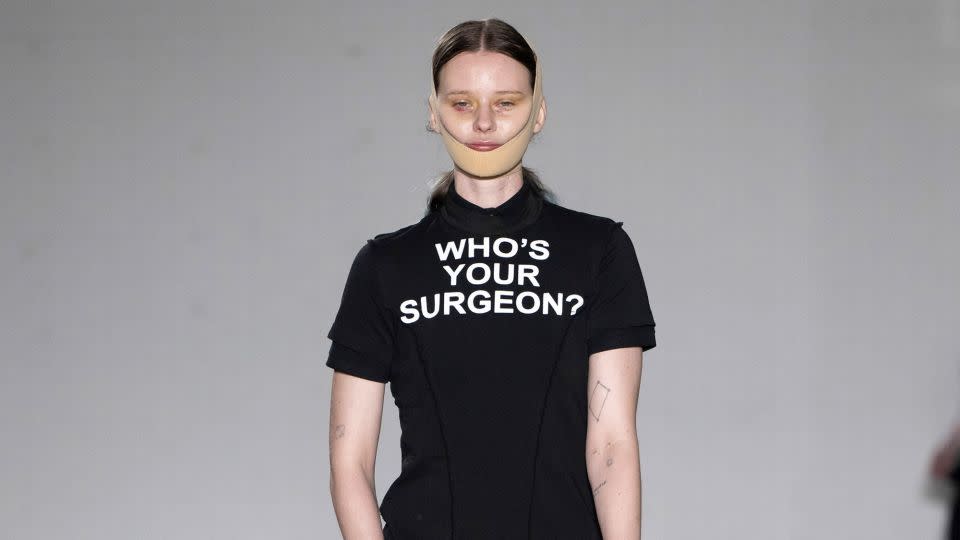 Natasha Zinko's show featured models in chin straps and hospital shoes, with bruised under eyes and noses. Zinko was inspired by plastic surgery and the contemporary dissatisfaction with outward appearance. - Stefan Knauer