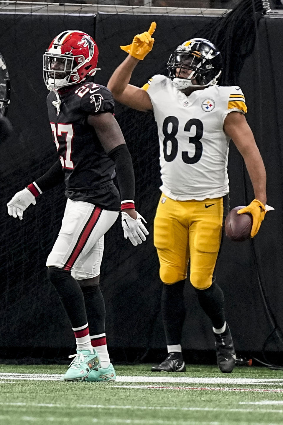 Pittsburgh Steelers tight end Connor Heyward (83) celebrates his touchdown against the Atlanta Falcons during the first half of an NFL football game, Sunday, Dec. 4, 2022, in Atlanta. (AP Photo/Brynn Anderson)