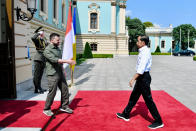 In this photo released by Indonesian Presidential Palace, Indonesian President Joko Widodo, right, is greeted by his Ukrainian counterpart Volodymyr Zelensky during their meeting in Kyiv, Ukraine on Wednesday, June 29, 2022. Widodo, whose country holds the rotating presidency of the Group of 20 leading rich and developing nations, is currently on a tour to Ukraine and Russia for meetings with the leaders of the two warring nations following a visit to Germany to attend the Group of Seven summit. (Laily Rachev, Indonesian Presidential Palace via AP)