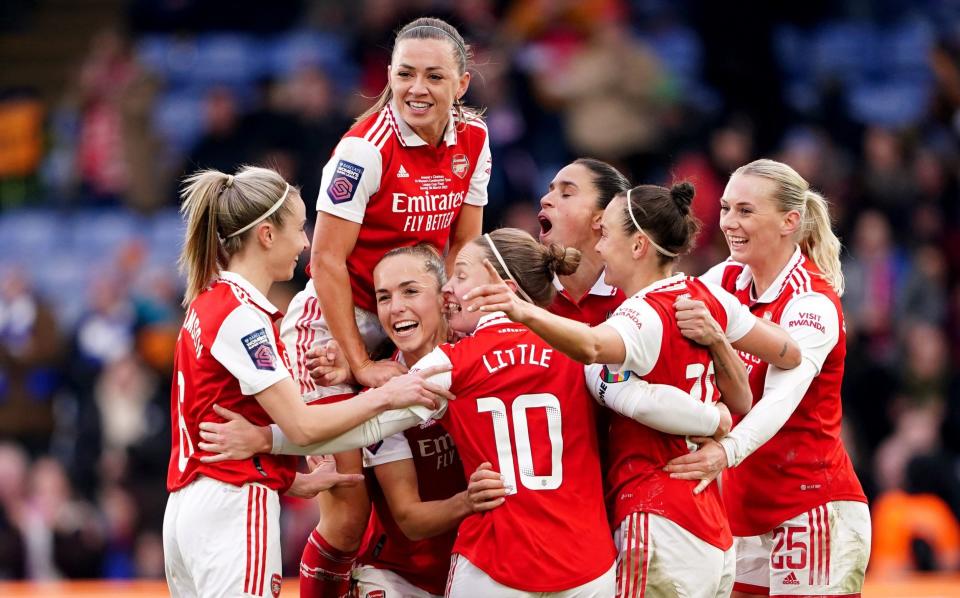Arsenal players celebrate after Chelsea's Niamh Charles (not pictured) scores an own goal during The FA Women's Continental Tyres League Cup final match at Selhurst Park - - PA/Zac Goodwin