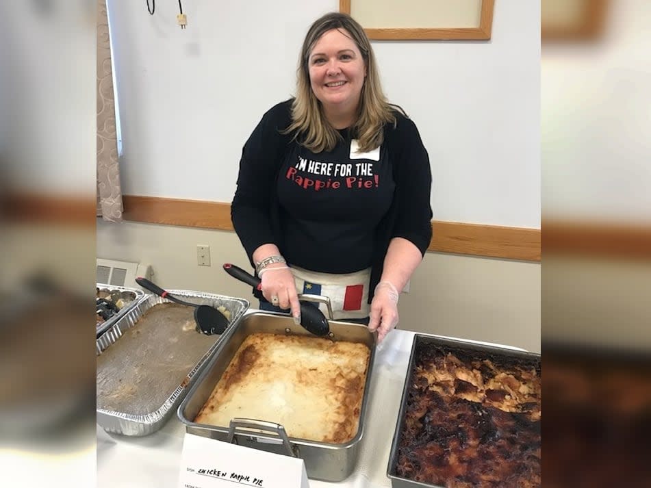 Michelle Trottier is shown at a previous rappie pie gathering in Wakefield, Mass. (Submitted by Michelle Trottier - image credit)