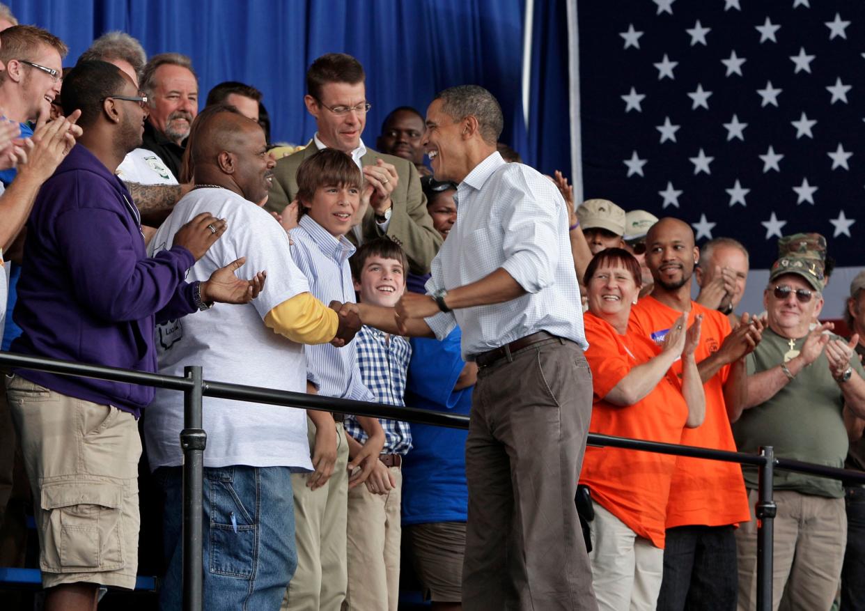 President Barack Obama greets supporters before speaking at Laborfest on the Summerfest grounds in Milwaukee on Sept. 6, 2010.