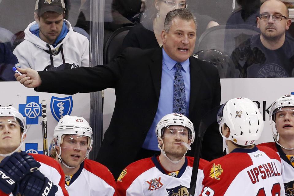 FILE - In this Jan. 20, 2014, file photo, Florida Panthers head coach Peter Horachek gives instructions during an NHL hockey game between the Pittsburgh Penguins and the Panthers in Pittsburgh. The Panthers have parted ways with Horachek, said Panthers general manager Dale Tallon, Tuesday, April 29, 2014, saying the dismissal was effective immediately. (AP Photo/Gene J. Puskar, File)