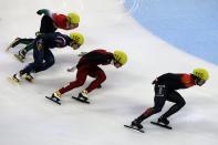 SHANGHAI, CHINA - DECEMBER 08: (L-R) Viktor Knoch of Hungary, Byeong-Jun Kim of Korea, Qiuwen Gong of China, Charles Hamelin of Canada compete in the Men's 1000m Quarter final during the day one of the ISU World Cup Short Track at the Oriental Sports Center on December 8, 2012 in Shanghai, China. (Photo by Hong Wu/Getty Images)