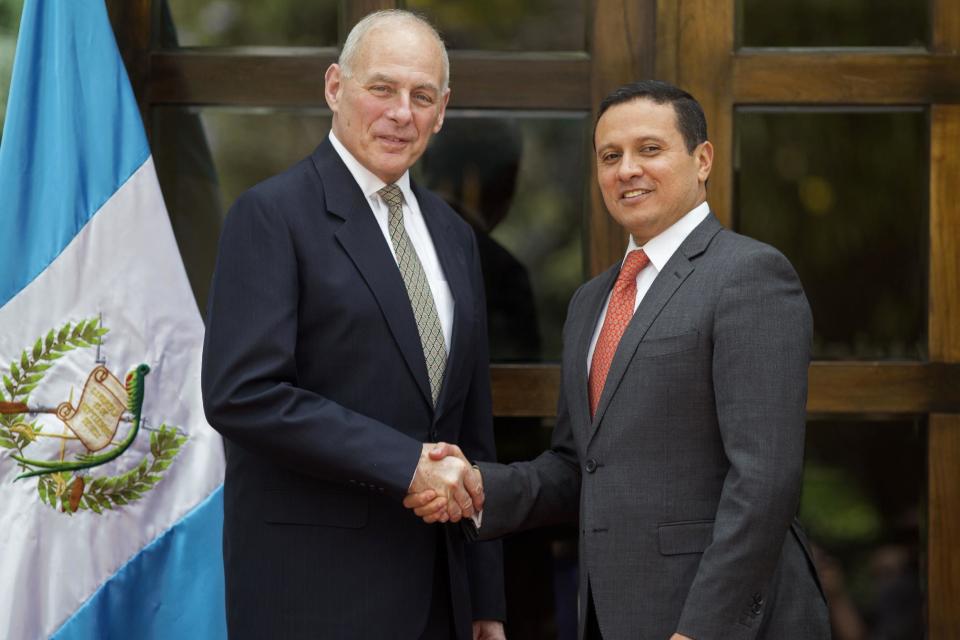 U.S. Secretary of Homeland Security John F. Kelly, left, shakes hands with Guatemala's Foreign Minister Carlos Morales, during a photo opportunity at the Foreign Affairs Ministry in Guatemala City, Wednesday, Feb. 22, 2017. Kelly is in Guatemala for a two day official visit. (AP Photo/Luis Soto)