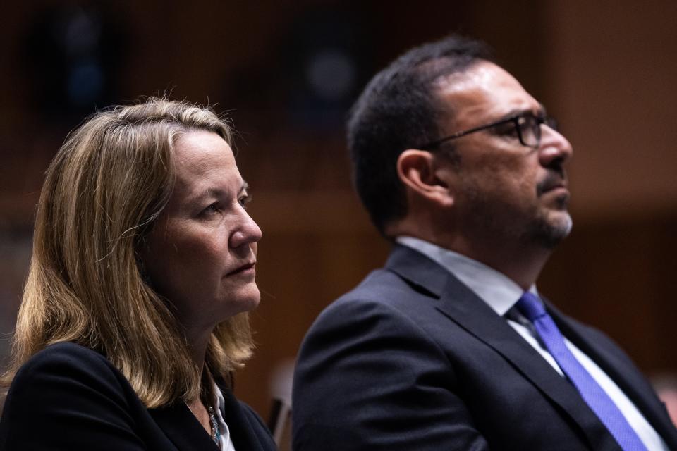 Attorney General Kris Mayes (left) and Secretary of State Adrian Fontes listen to Gov. Katie Hobbs give her State of the State address to the Arizona House of Representatives during the opening session of the 56th Legislature on Jan. 9, 2023, in Phoenix.