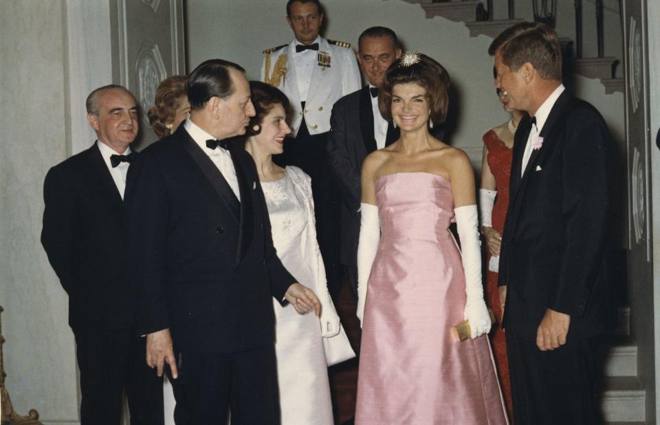 <p>President John F. Kennedy and First Lady Jackie Kennedy attend a dinner in honor of Minister of State for Cultural Affairs of France, Andre Malroux (left).</p>