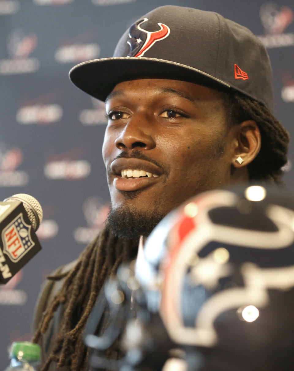 Houston Texans No. 1 overall NFL draft pick defensive end Jadeveon Clowney meets the media during an introductory NFL football news conference Friday, May 9, 2014, in Houston. (AP Photo/Pat Sullivan)
