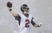 <p>Atlanta Falcons quarterback Matt Ryan passes in the fog during the second half of an NFL football game against the New England Patriots, Sunday, Oct. 22, 2017, in Foxborough, Mass. (AP Photo/Charles Krupa) </p>
