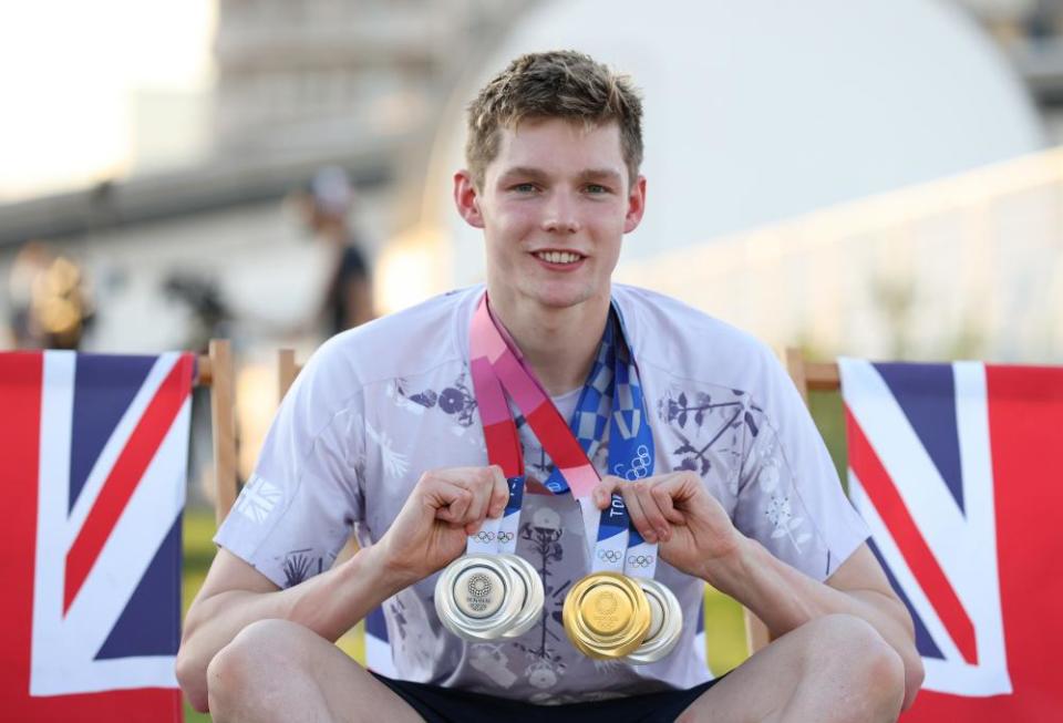 Duncan Scott with his haul of one gold and three silver medals from Tokyo.