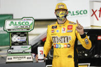 Kyle Busch celebrates after winning the NASCAR Xfinity Series auto race at Charlotte Motor Speedway Monday, May 25, 2020, in Concord, N.C. (AP Photo/Gerry Broome)