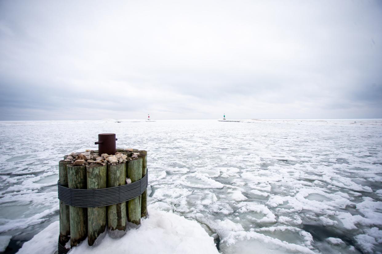 An ice-covered Lake Michigan rests Friday, Feb. 12, 2022, at Holland State Park.