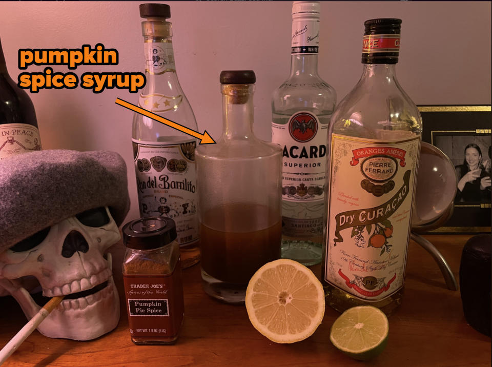 - 1 ounce dark rum - 1 ounce dry curacao or triple sec - 1 ounce white rum - 1 ounce pumpkin spice syrup - juice of 1/2 a lemon - juice of 1/2 a lime - pumpkin pie spice, cinnamon stick, and mint, for garnish 